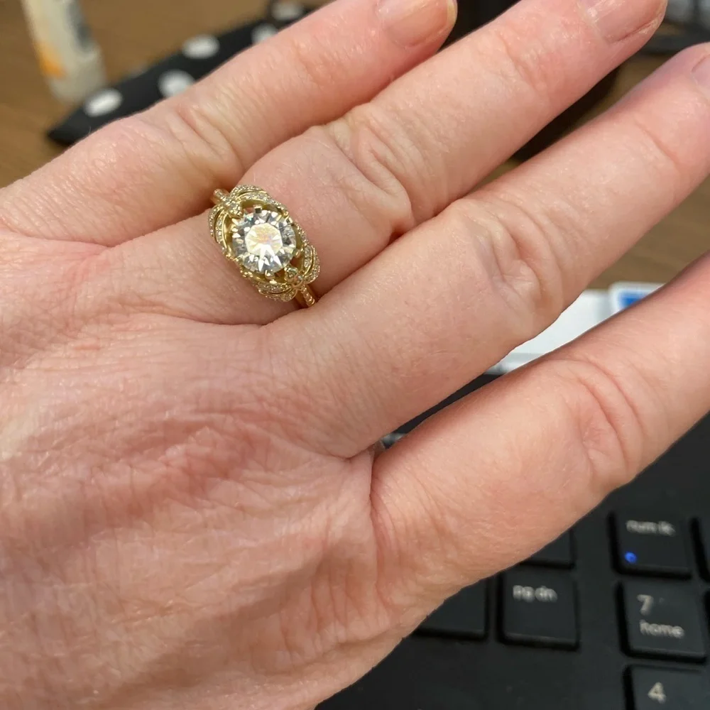 10kt yellow gold and moissanite dragonfly ring.